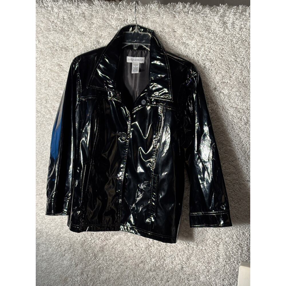 WOMEN.S SHINY BLACK RAIN COAT..